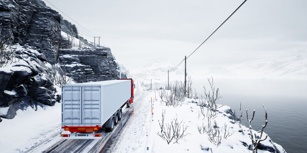 Red truck transport with container on winter road