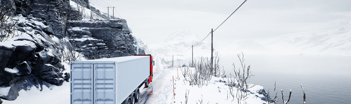 Red truck transport with container on winter road